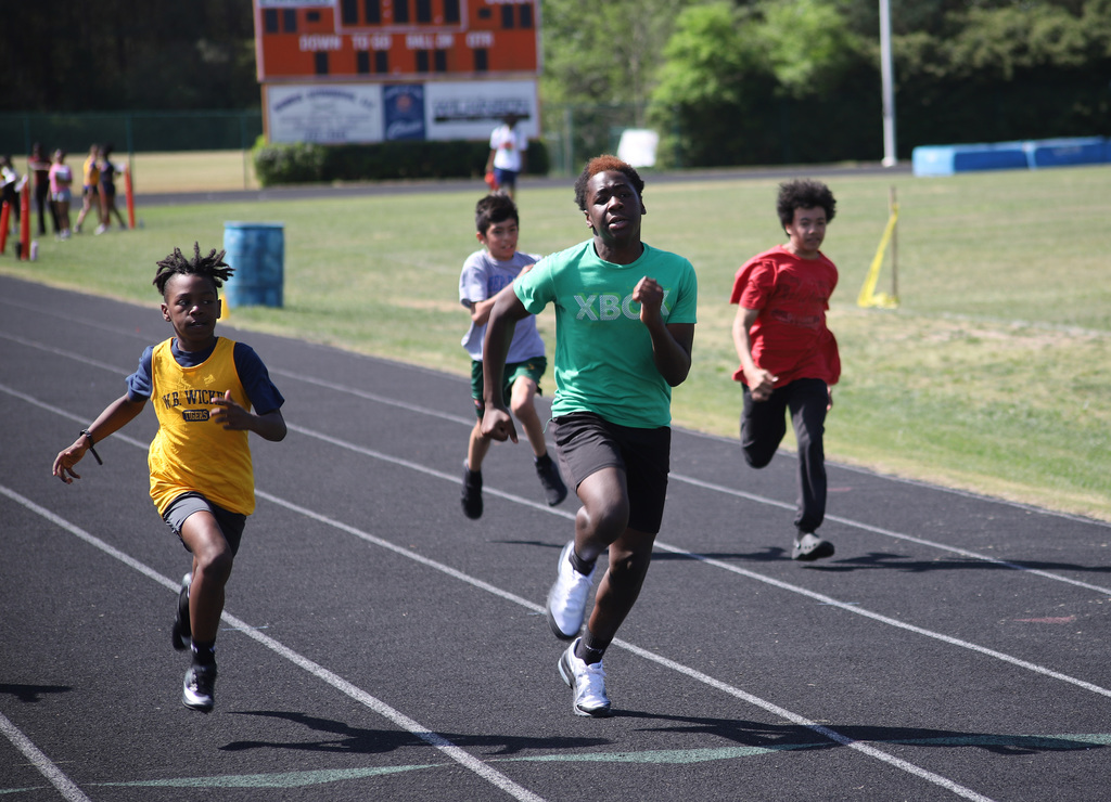 Students race in the Fifth Grade Track Day event at Southern Lee High School