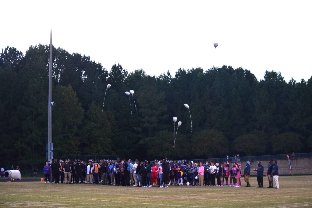 Teams and families gather to remember Coach Whomp