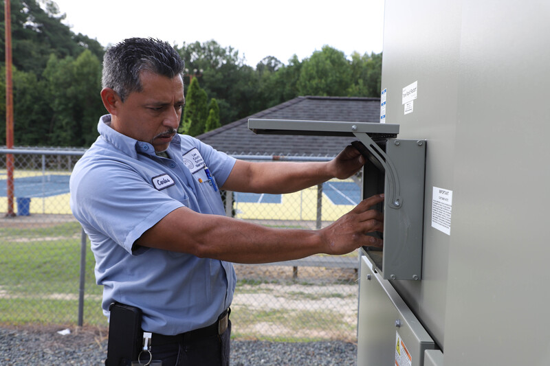 Maintenance Department Workers doing various projects around the district