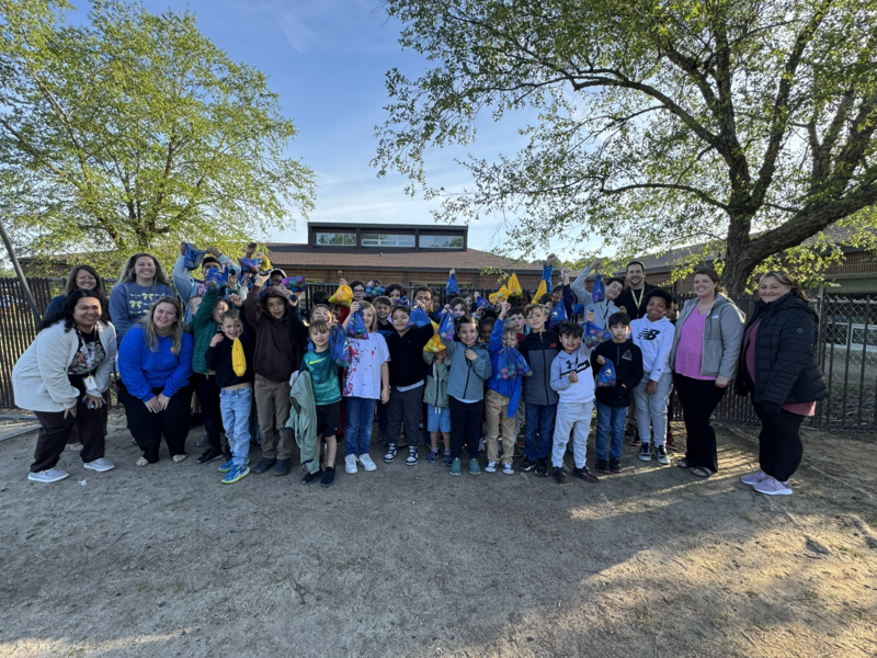 Students in Military Group at JGE celebrate an Easter Egg hunt at school