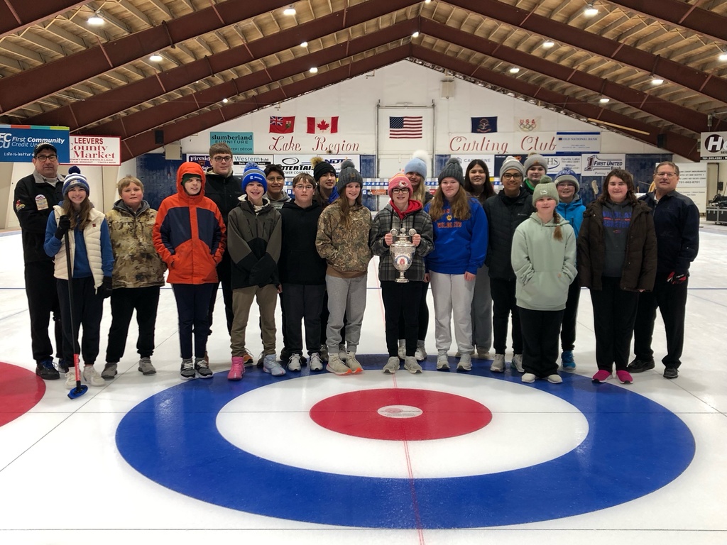 Holding the Herries-Maxwell Trophy