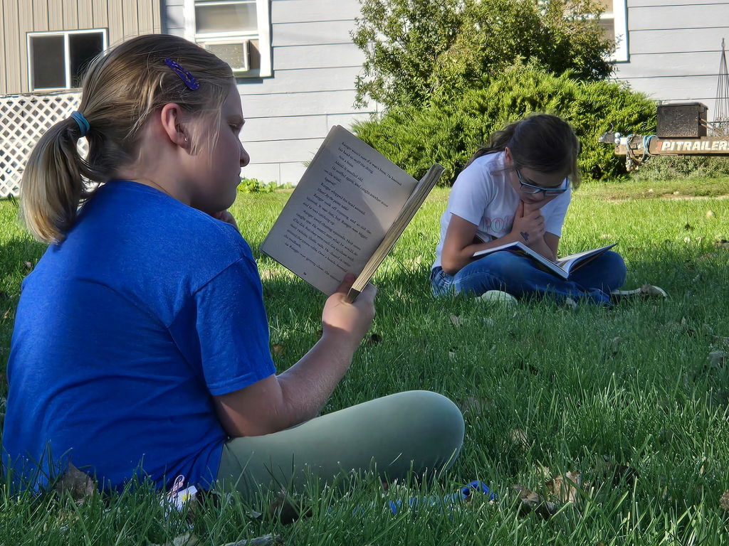 3rd Grade Reading in grass