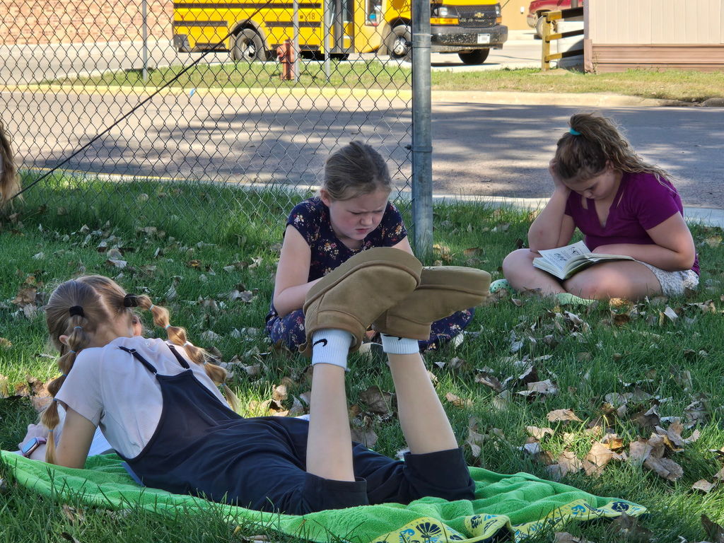 3rd Grade Reading in grass
