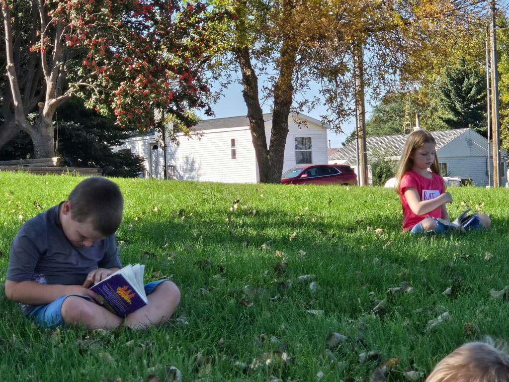 3rd Grade Reading in grass