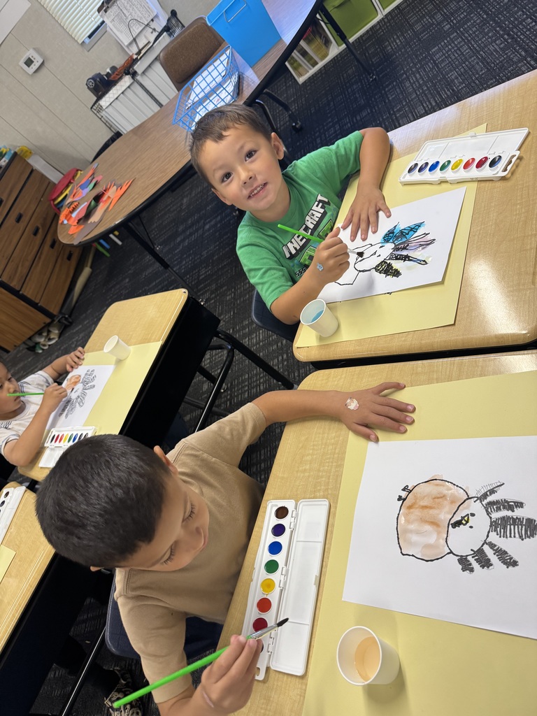 Students painting a turkey