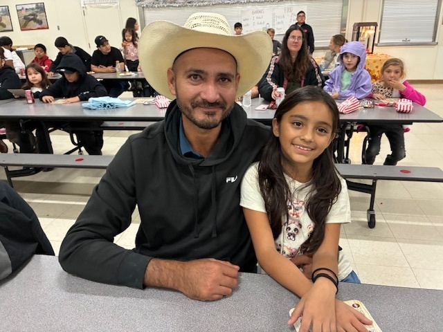 Father and daughter at bingo night