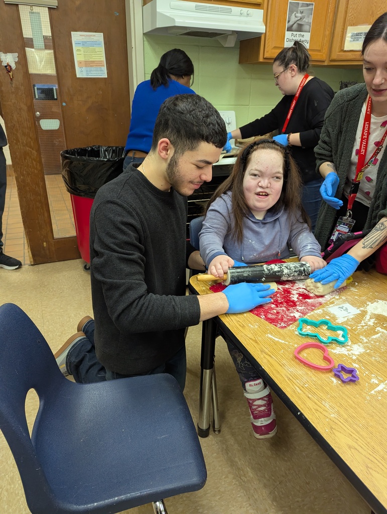 Unified PE group making valentines day cookies with Ms. Liz's class!
