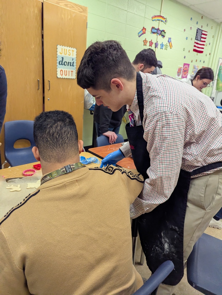Unified PE group making valentines day cookies with Ms. Liz's class!