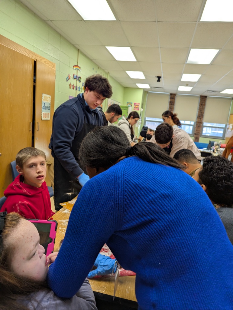 Unified PE group making valentines day cookies with Ms. Liz's class!