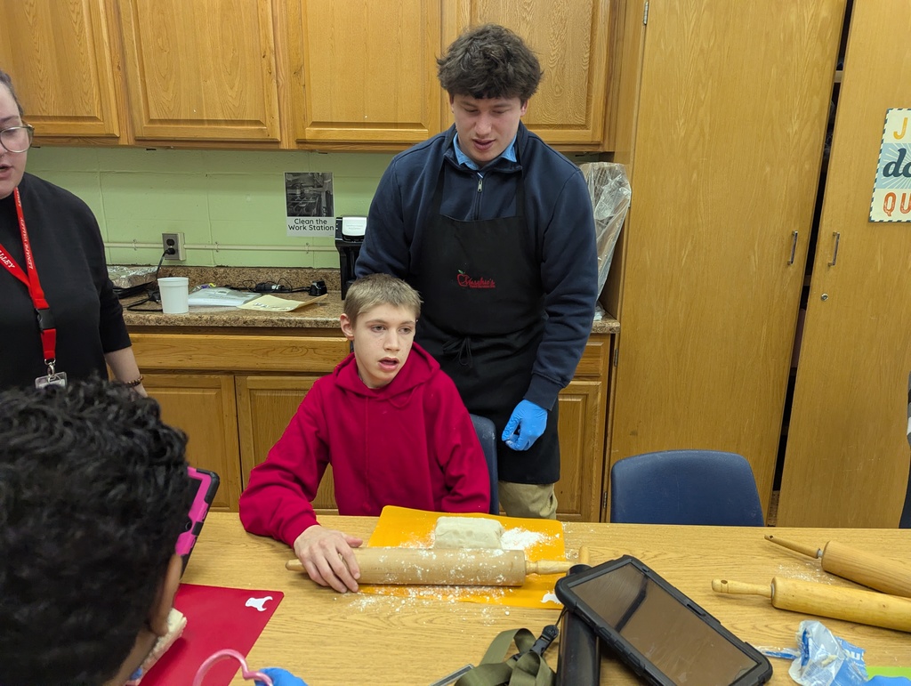 Unified PE group making valentines day cookies with Ms. Liz's class!