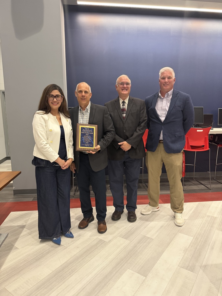 Veronica Gawlick poses with Mr. Kuncken,  Dr. Rossi, and Mr. Reynolds, and an award plaque as the Lenape Valley Board of Education honors her as the 2025–2026 Education Specialist of the Year.