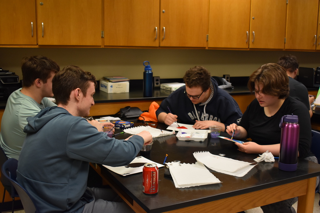 students painting