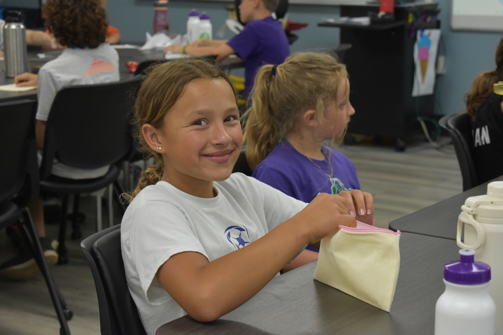Student smiling at camera