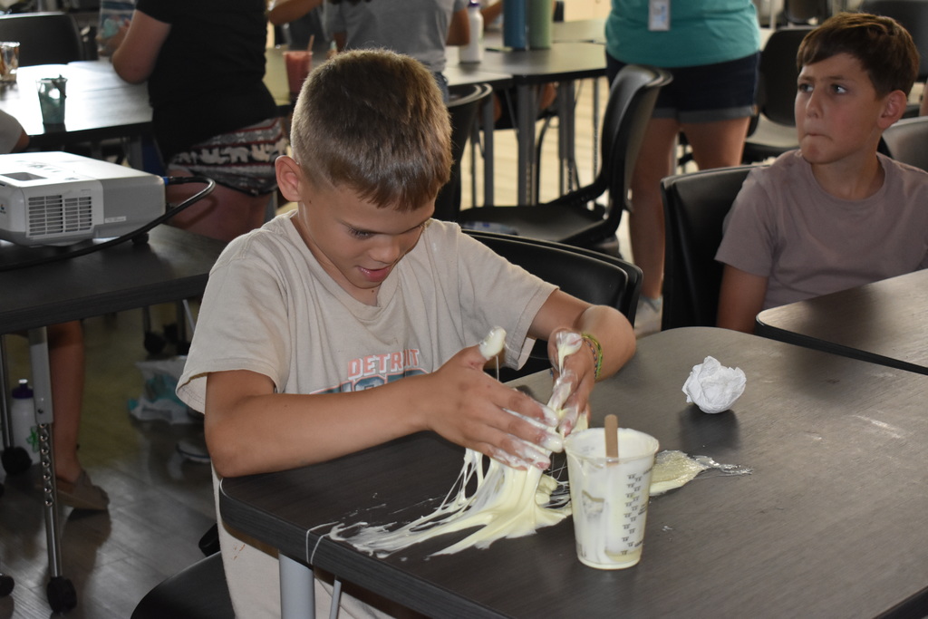 Student playing with slime