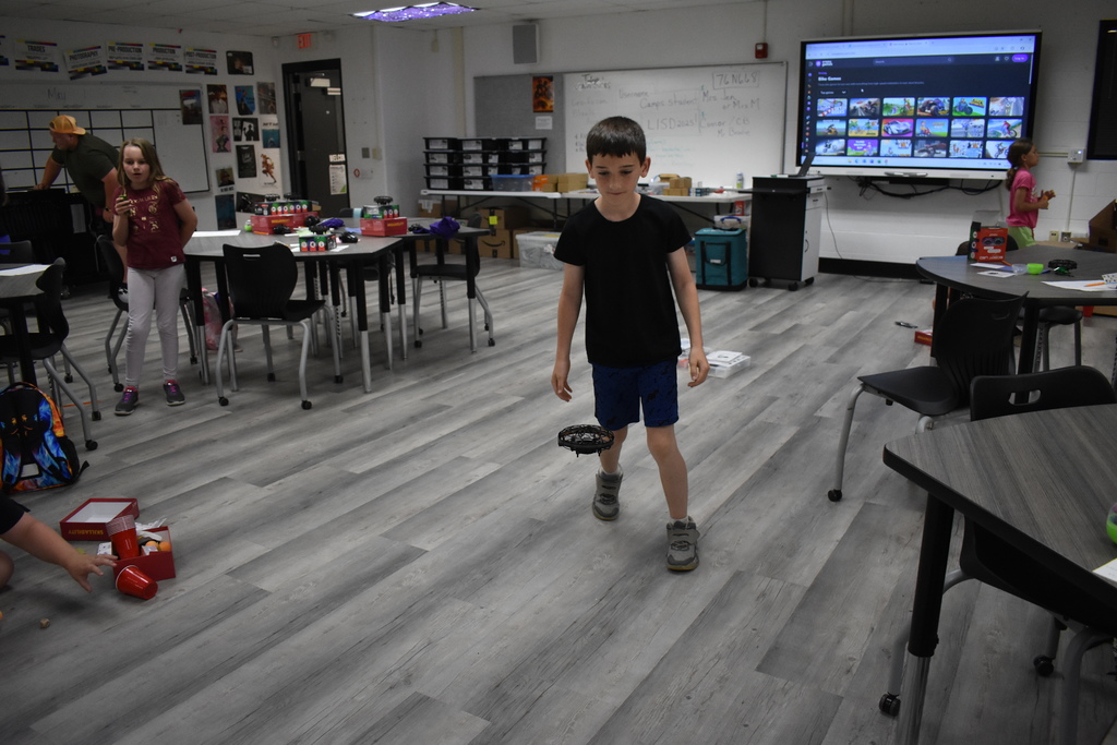 Student flying a drone