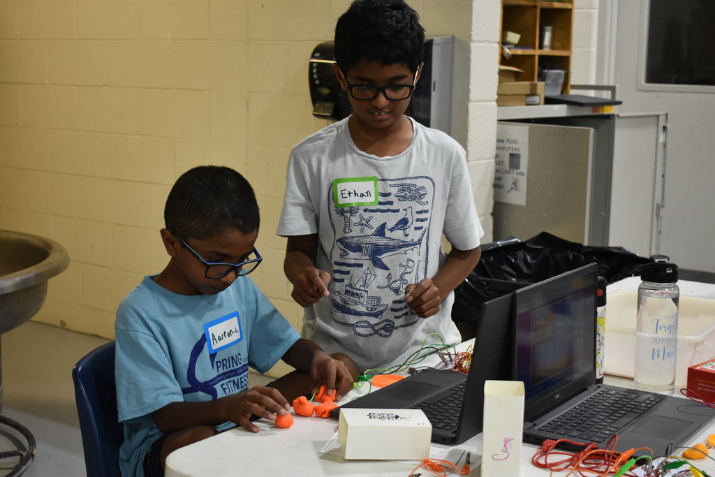 Students learning about circuit boards