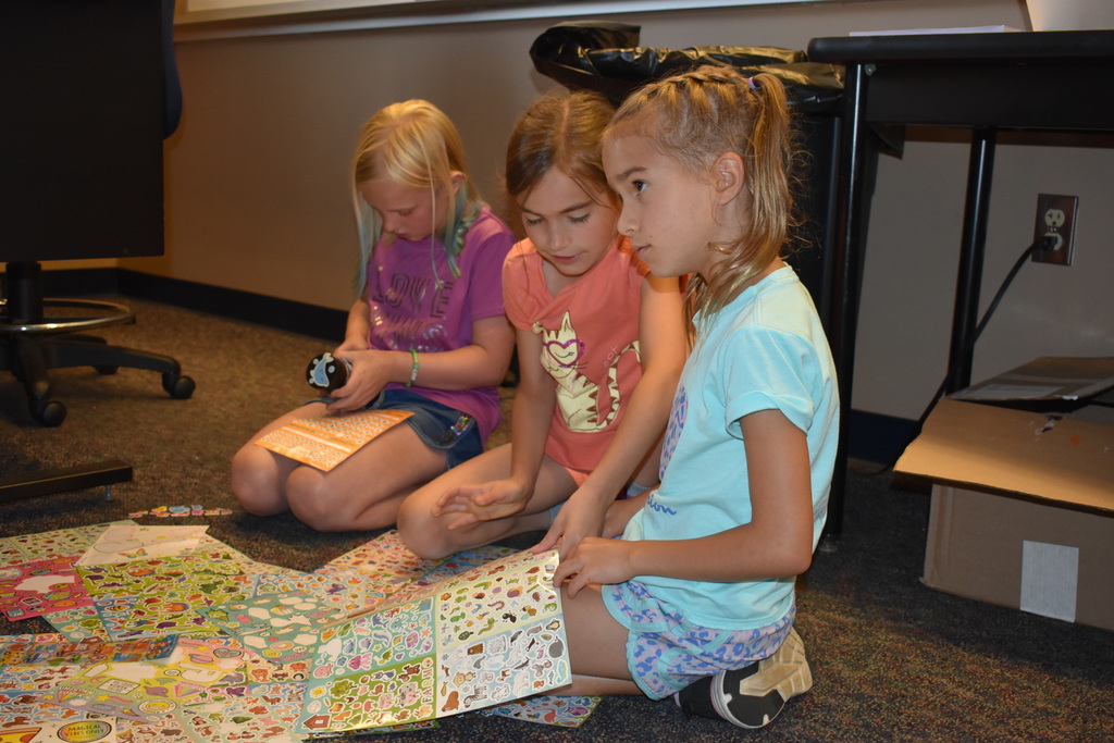 Students using stickers