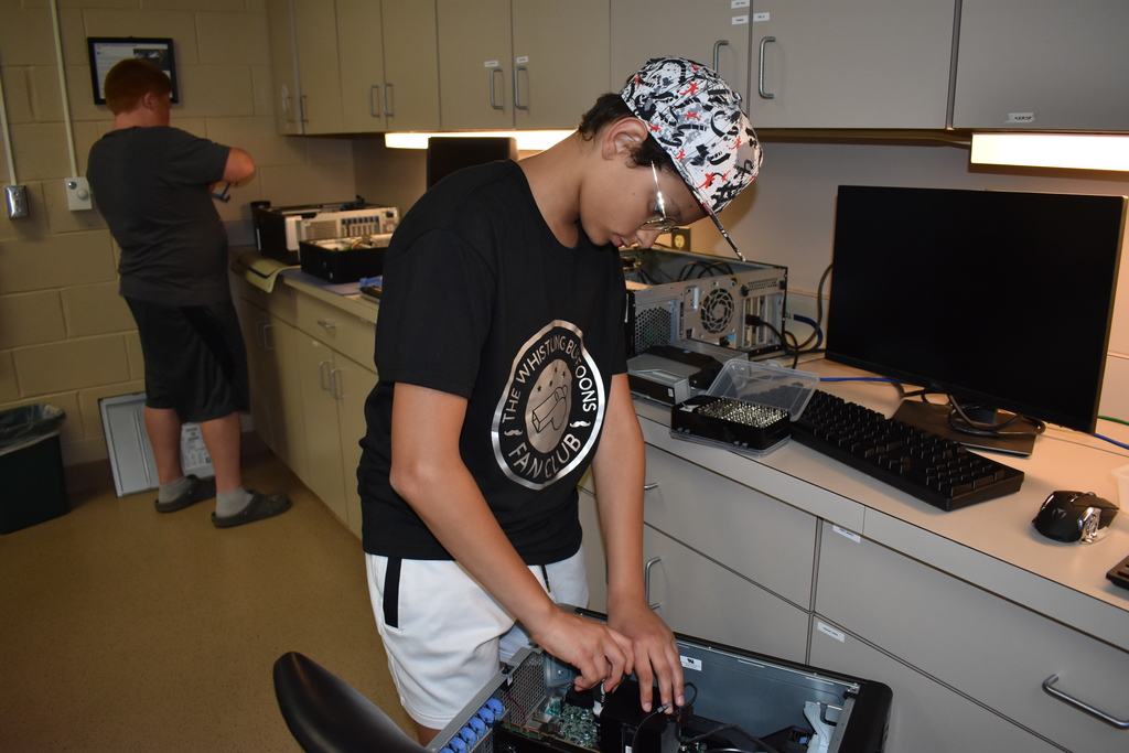 Student rebuilding a computer