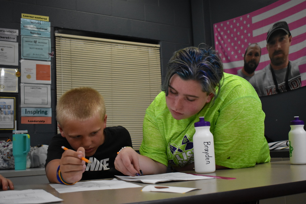 Student getting help with calculations