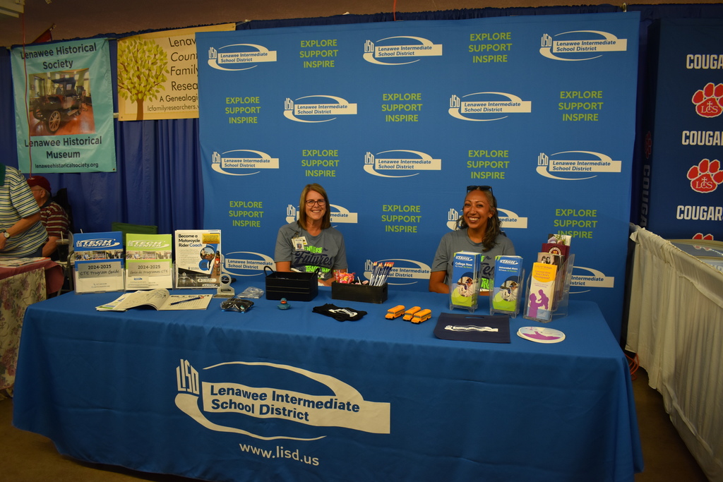 Photo of Jenny Heath and Monica Flores at the Lenawee County Fair
