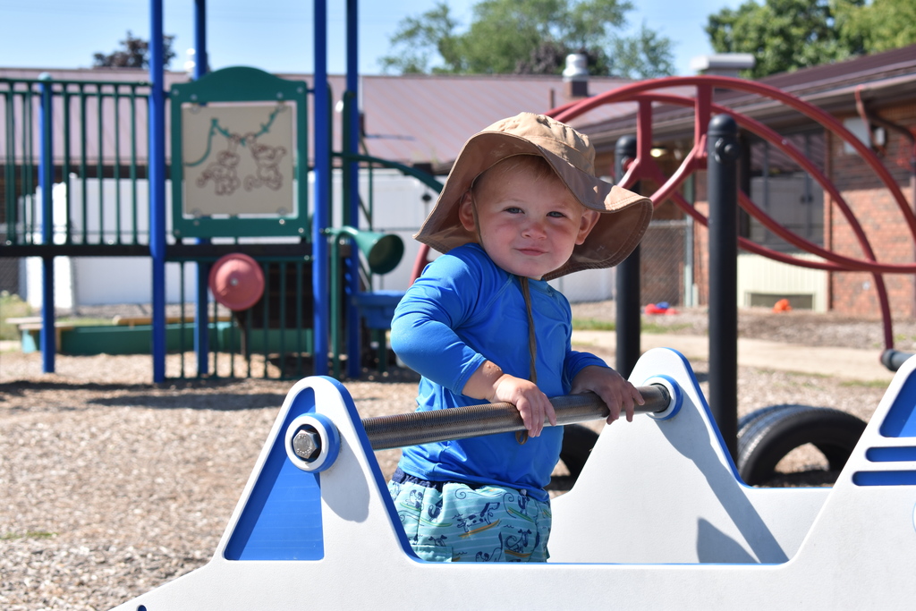 Little boy playing on playground