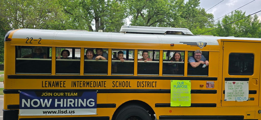 People on the LISD bus in the parade