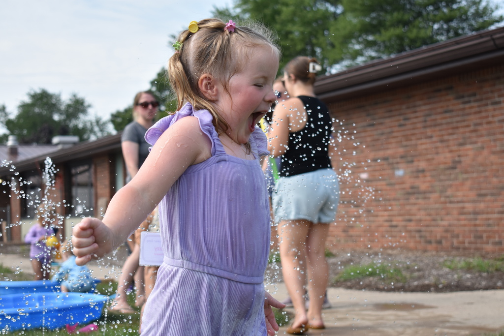 Little girl playing in water