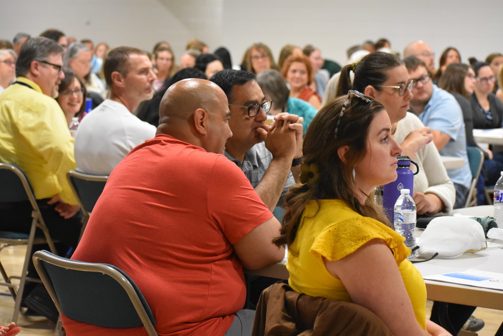 Staff members listening in