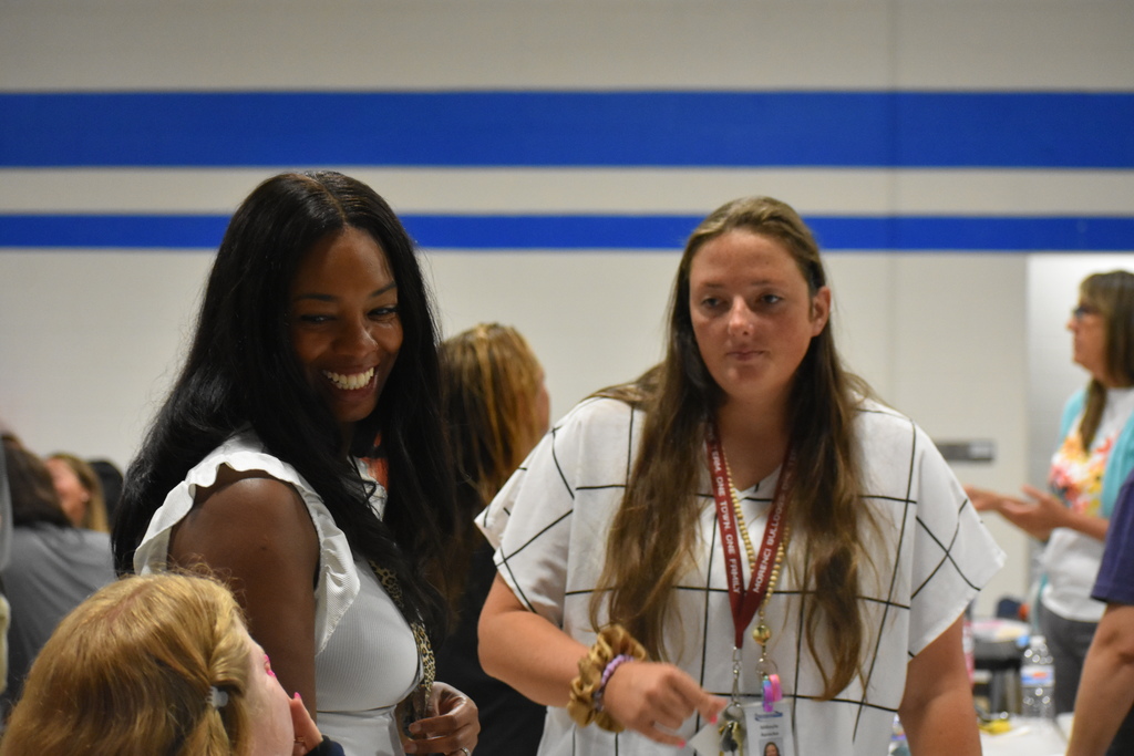 Staff talking and laughing