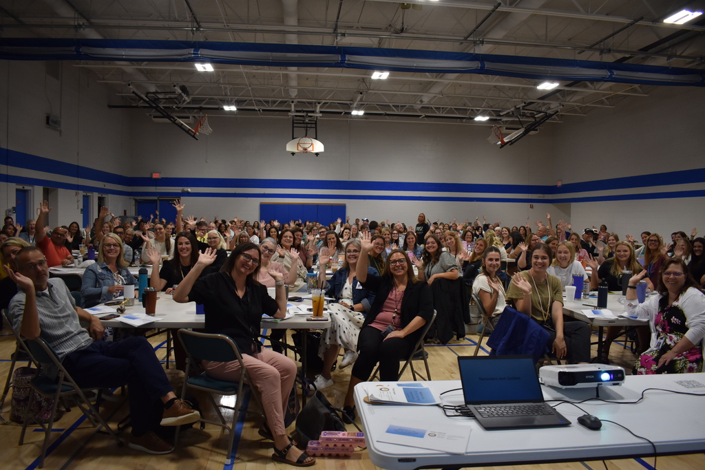 Staff at Porter waving to the camera
