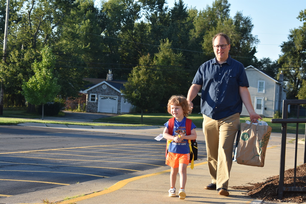 A parent and child arriving for the first day
