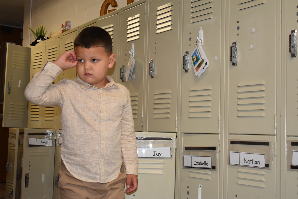 a student adjusting to a new locker