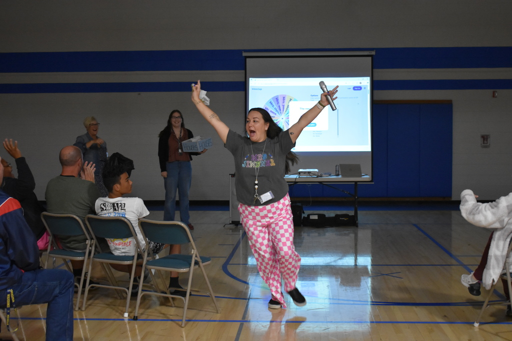 An instructor very excited about her team