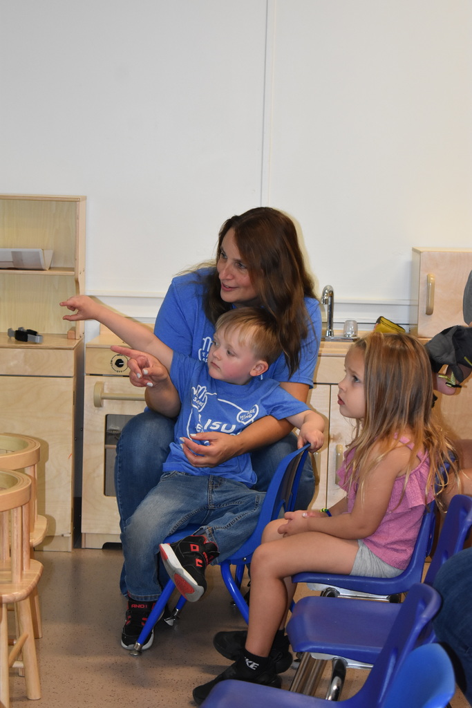 teacher and students listening on 