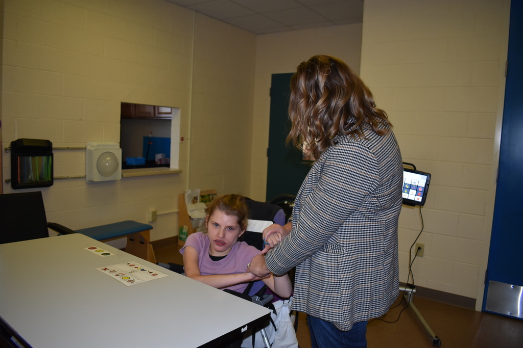 A student enjoying a visit with Julie VanBlack
