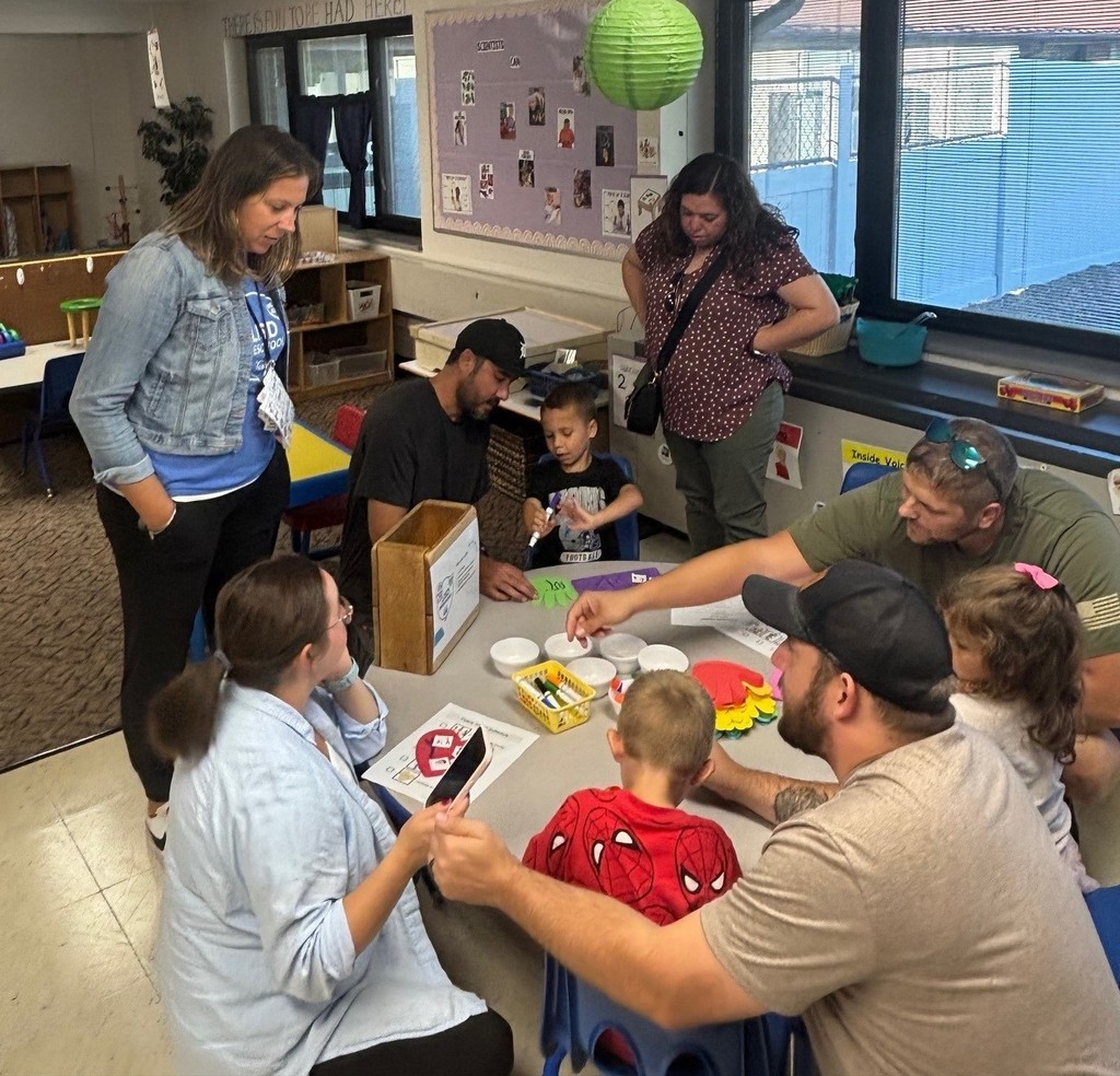Families participating in activities at Family night