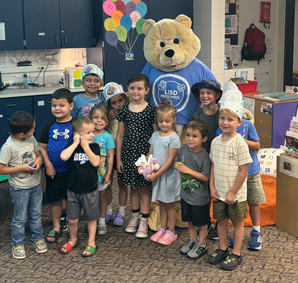 Students posing with Barry