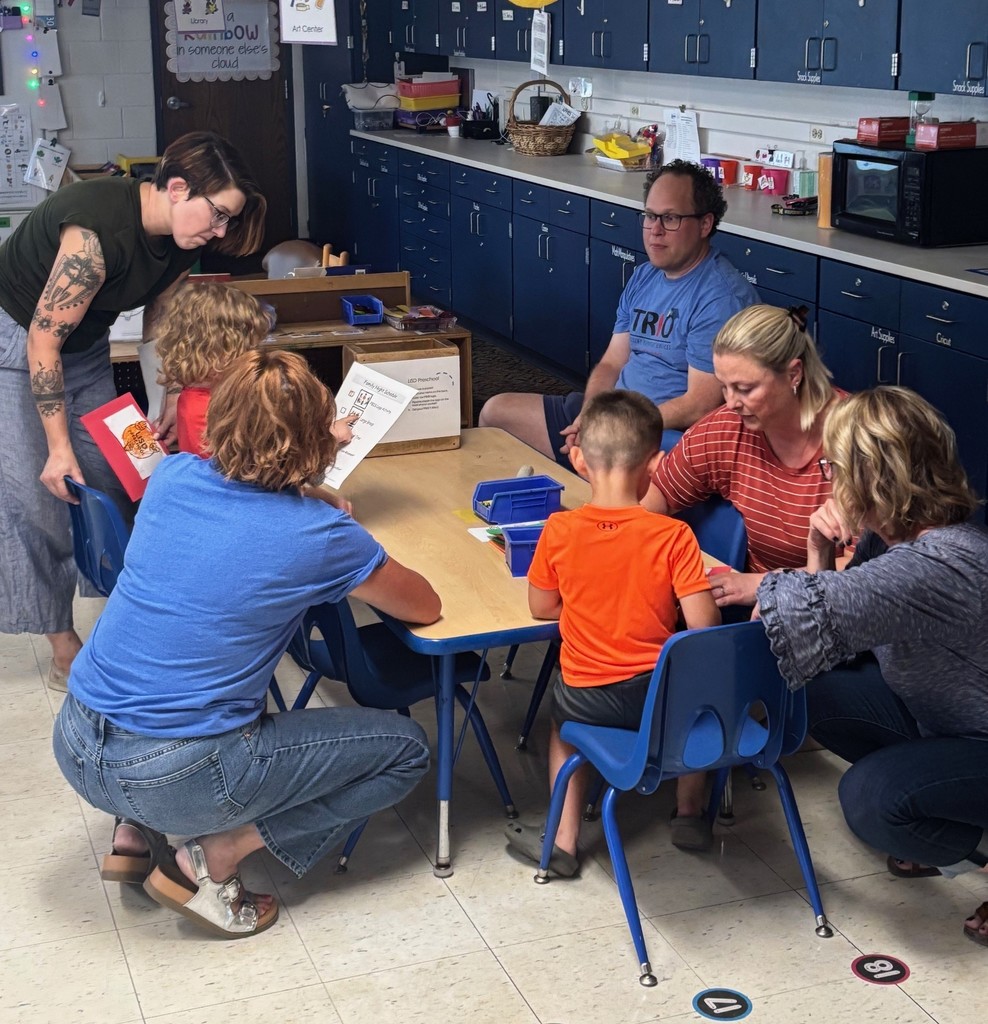 Families participating in activities at Family night