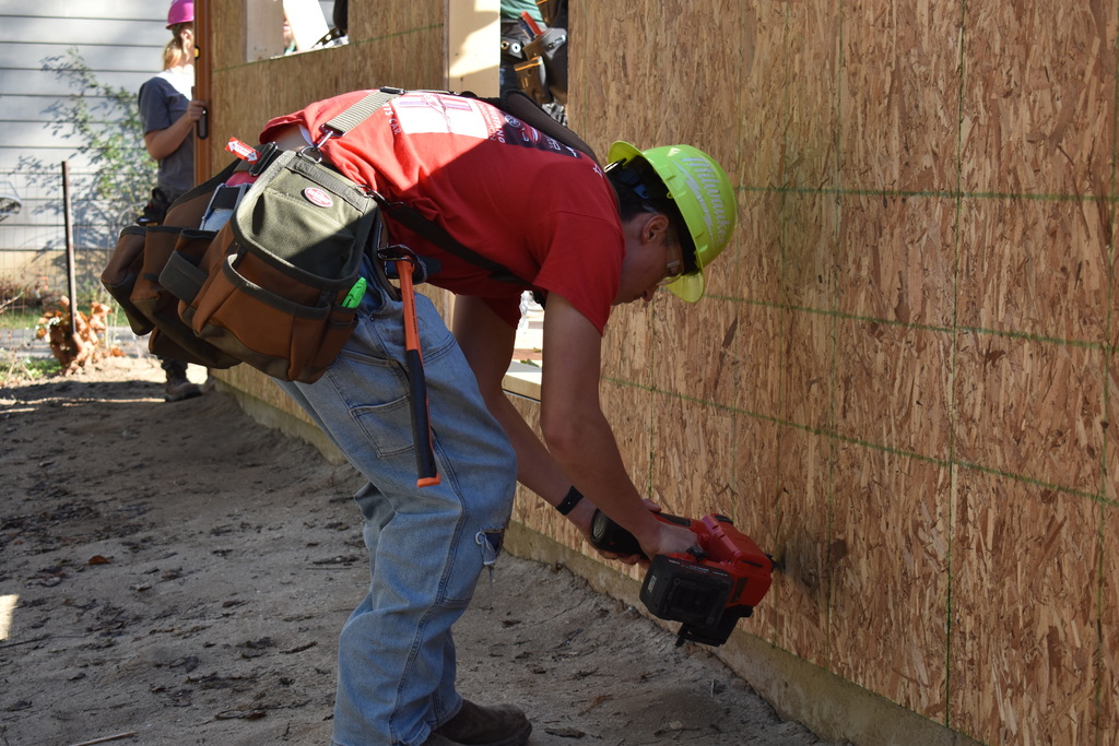 Student using nail gun