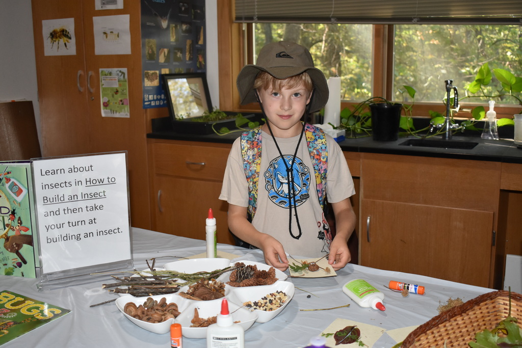 A kid working on a craft