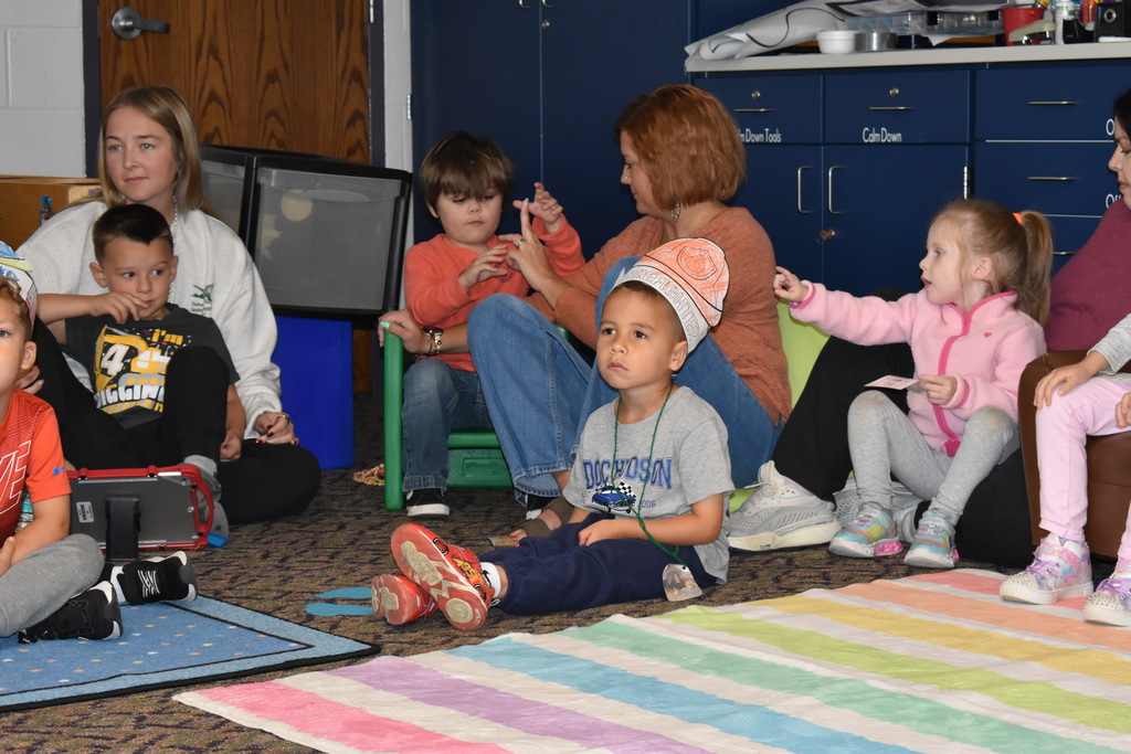 Students listening to the firefighter
