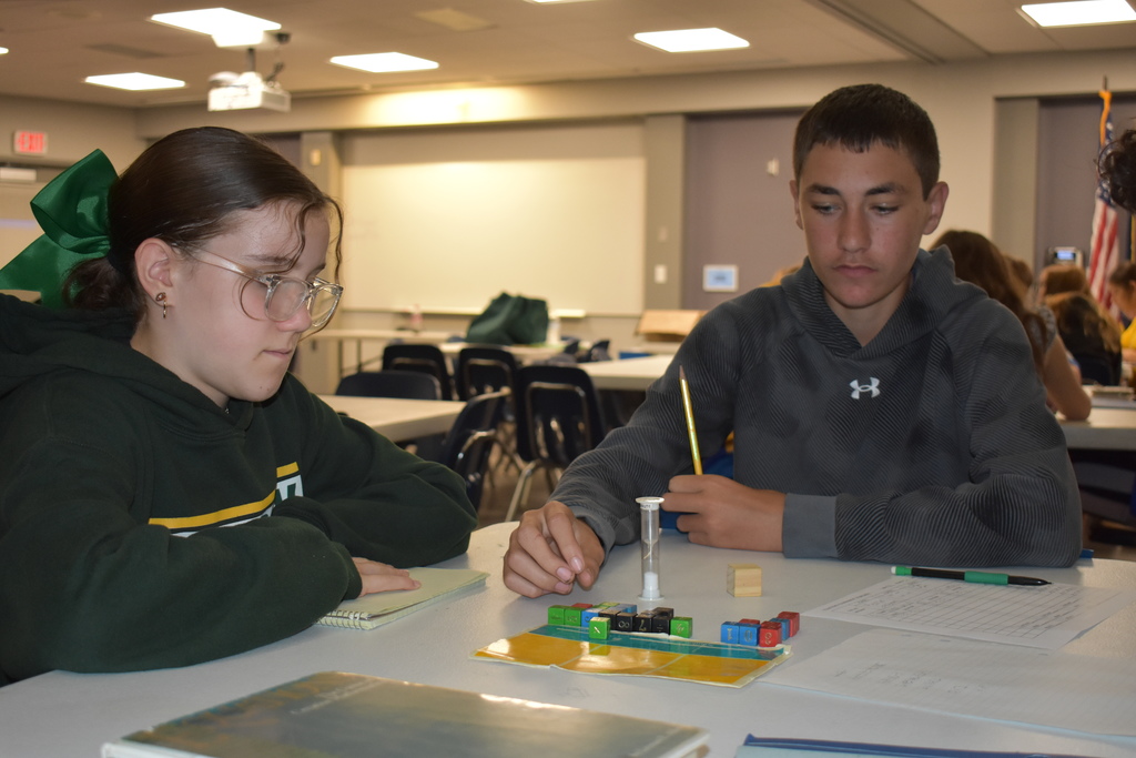 A student prepares to make his move
