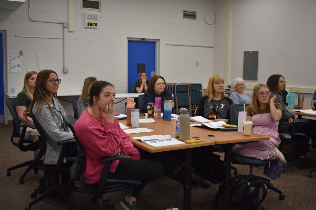 Room full of people learning