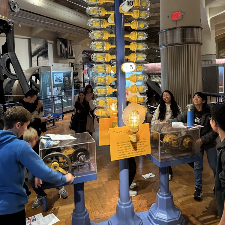 students exploring the museum with hands on activity 