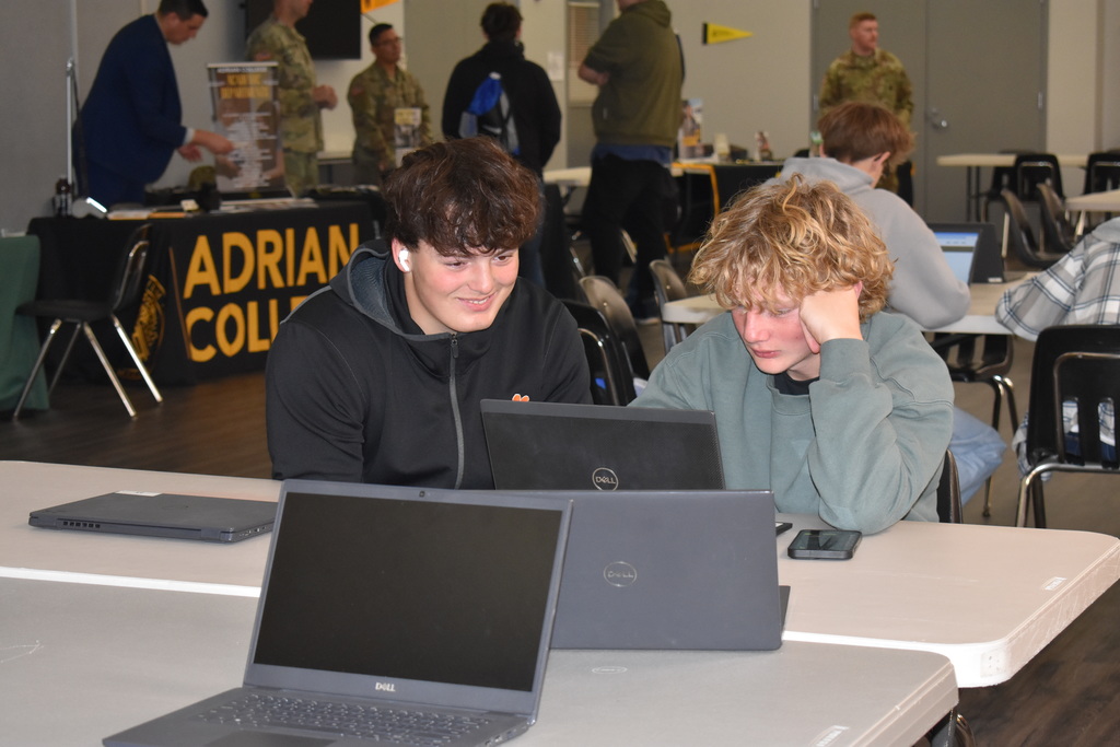 Two students work on an application together