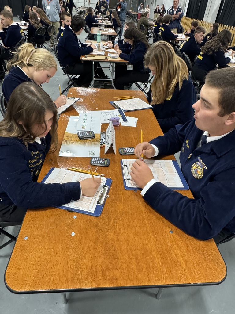 Students during the competition at a table