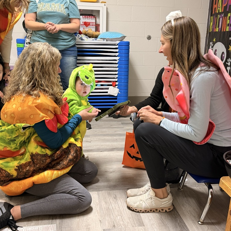 adults and child in costumes 