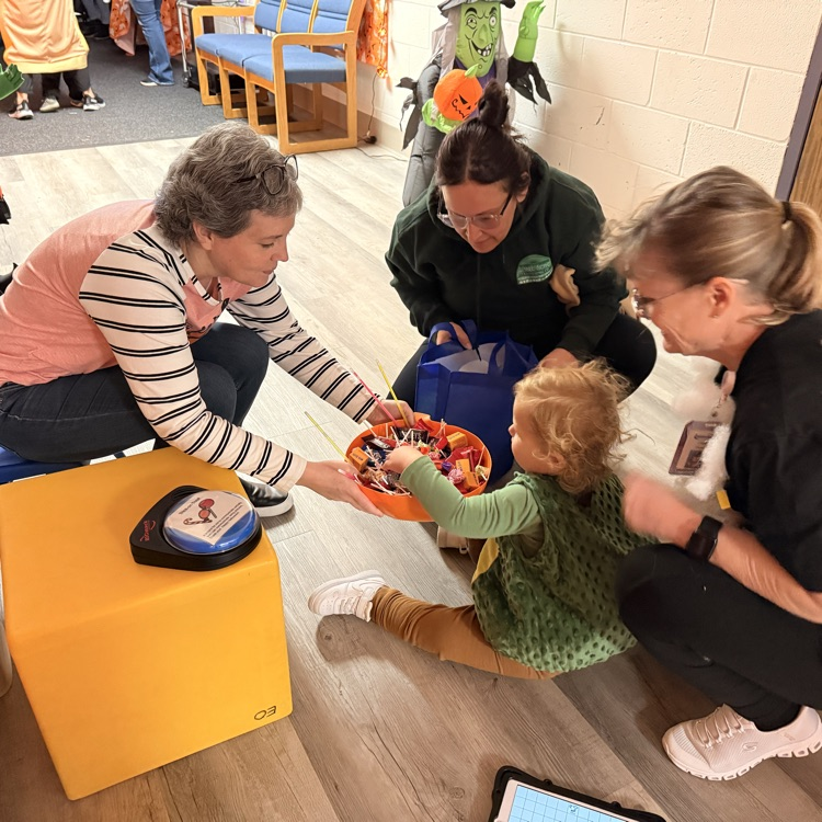 adults and child in costumes 