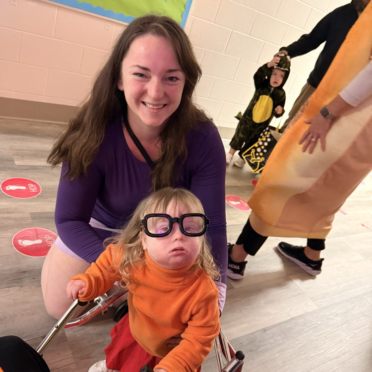 adults and child in costumes 