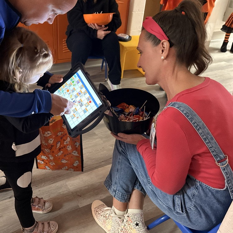 adults and child in costumes 